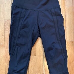 Lululemon cropped black leggings with mesh panels
